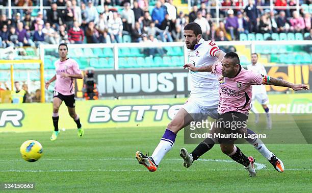 Fabrizio Miccoli of Palermo scores his team's opening goal during the Serie A match between US Citta di Palermo and ACF Fiorentina at Stadio Renzo...