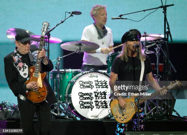 Rick Nielsen, Daxx Nielsen and Robin Zander of Cheap Trick perform during the 2021 iHeartRadio Music Festival at T-Mobile Arena on September 17, 2021...