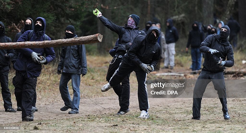 Anti-nuclear protesters throw stones at