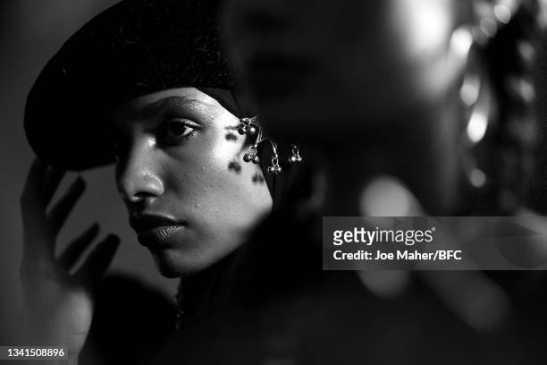 Model backstage ahead of the OSMAN show during London Fashion Week September 2021 on September 20, 2021 in London, England.