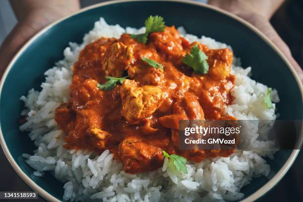 indian chicken curry served with rice - tikka masala stock pictures, royalty-free photos & images