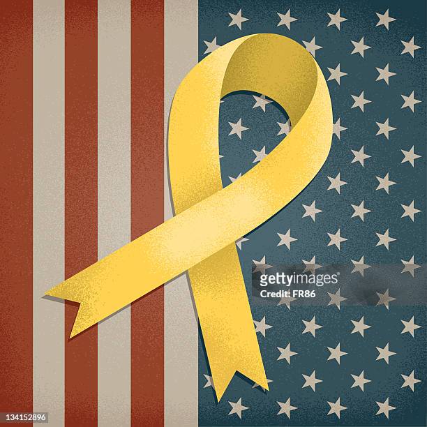 a yellow awareness ribbon on an american flag background - yellow ribbon stock illustrations