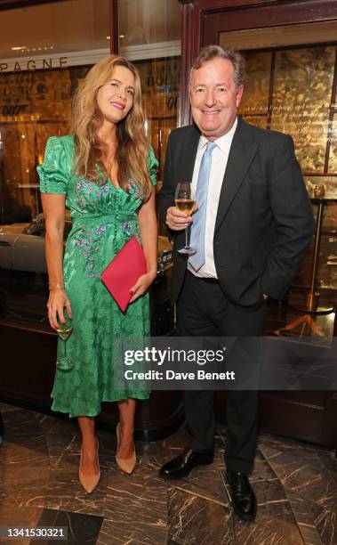 Celia Walden and Piers Morgan attend the Burlington Arcade 007 installation launch, in partnership with EON Productions and Universal Pictures...