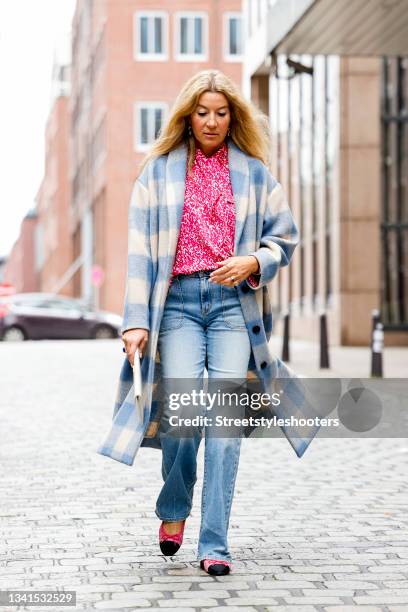 September 20: Yasmin von Schlieffen-Nannen, wearing a pink patterned blouse by Isabel marant, a Jeans by Nili Lotan, a blue-white checked coat by...