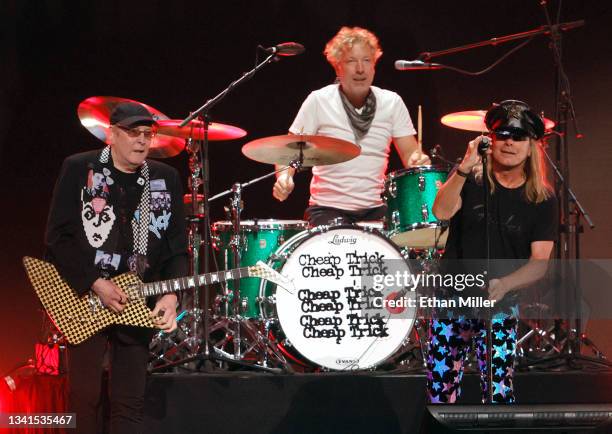 Rick Nielsen, Daxx Nielsen and Robin Zander of Cheap Trick perform during the 2021 iHeartRadio Music Festival at T-Mobile Arena on September 17, 2021...