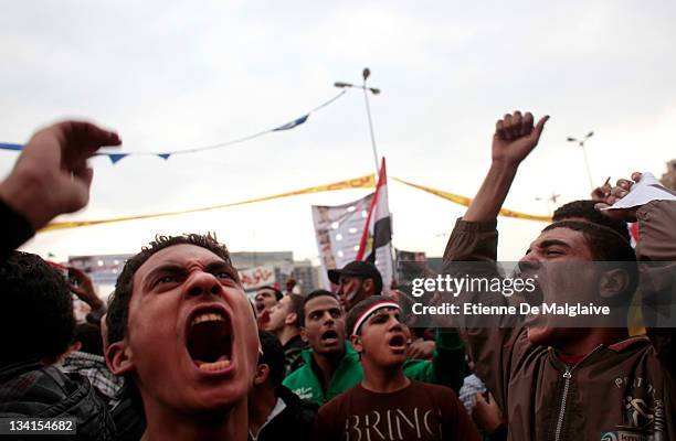 Protesters gather and shout slogans in Tahrir Square on November 27, 2011 in Cairo Egypt. Thousands of Egyptians are continuing to occupy Tahrir...