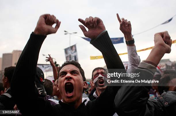 Protesters gather and shout slogans in Tahrir Square on November 27, 2011 in Cairo Egypt. Thousands of Egyptians are continuing to occupy Tahrir...