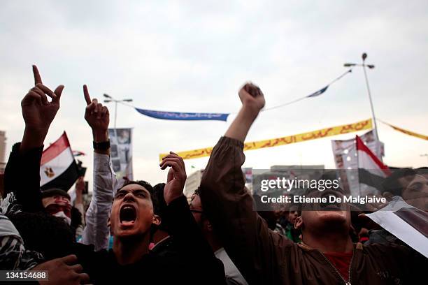 Protesters gather and shout slogans in Tahrir Square on November 27, 2011 in Cairo Egypt. Thousands of Egyptians are continuing to occupy Tahrir...