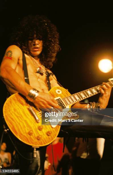 Slash of the rock group 'Guns n' Roses' perform at the LA Street Scene on September 28, 1985 in Los Angeles, California. Slash uses a Gibson Les Paul...