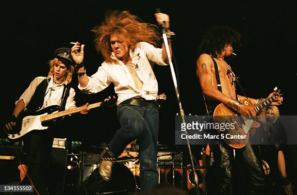 Duff McKagan, Axl Rose and Slash of the rock group 'Guns n' Roses' perform at the LA Street Scene on September 28, 1985 in Los Angeles, California....