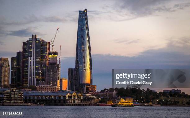 Ferry passes the Crown Towers Sydney at Barangaroo on August 31, 2021 in Sydney, Australia.