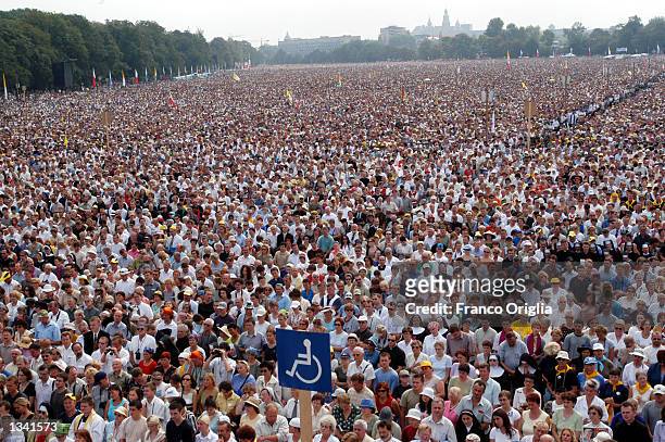 Crowd of more than two million people attend a mass celebrated by Pope John Paul II August 18, 2002 at Blonia park in Krakow, Poland. The Pope is in...
