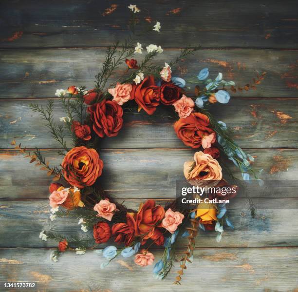 rustic wood background with fall wreath of roses - autumn wreath stock pictures, royalty-free photos & images