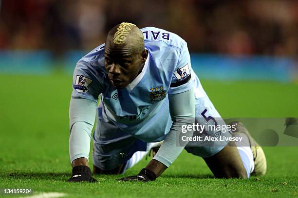 Mario Balotelli of Manchester City looks on during the Barclays Premier League match between Liverpool and Manchester City at Anfield on November 27,...