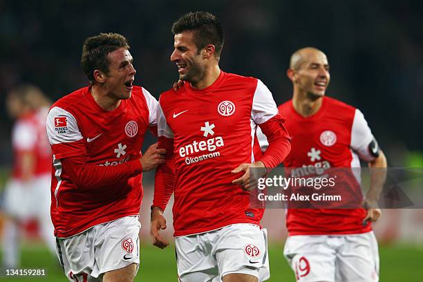 Marco Caligiuri of Mainz celebrates his team's second goal with team mates (Nicolai Mueller and Elkin Soto during the Bundesliga match between FSV...