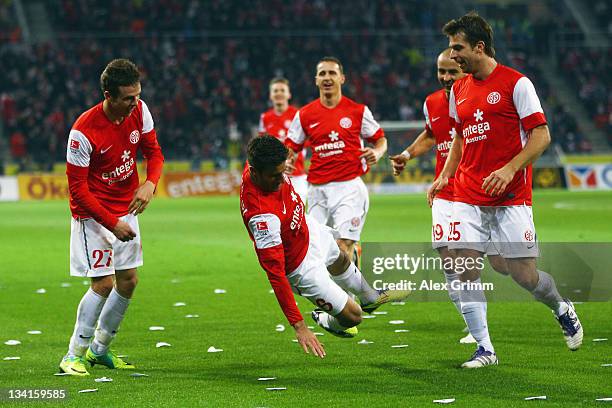 Marco Caligiuri of Mainz celebrates his team's second goal with team mates Nicolai Mueller Zdenek Pospech, Elkin Soto and Andreas Ivanschitz during...