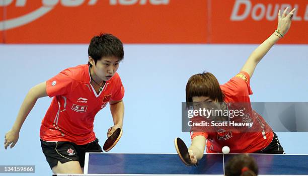 Guo Yue and Li Xiaoxia of China in action during their Women's Doubles Final match against Fukuhara Ai and Ishikawa Kasumi of Japan during day four...