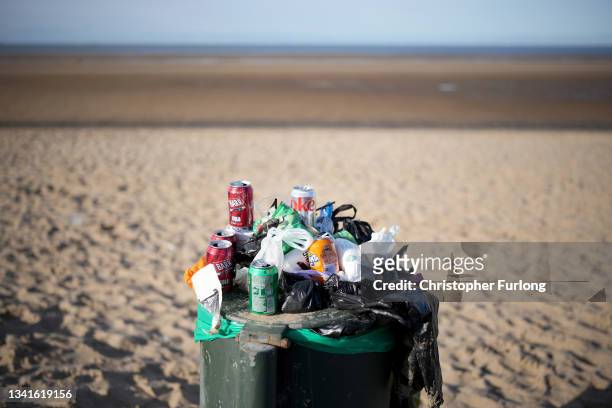 Bin overflows with rubbish on Talacre Beach and the Dee Estuary on September 20, 2021 in Talacre, Wales.