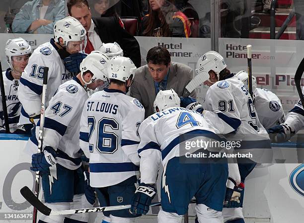 Head coach Guy Boucher of the Tampa Bay Lightning talks to the players during a time out against the Florida Panthers on November 25, 2011 at the...