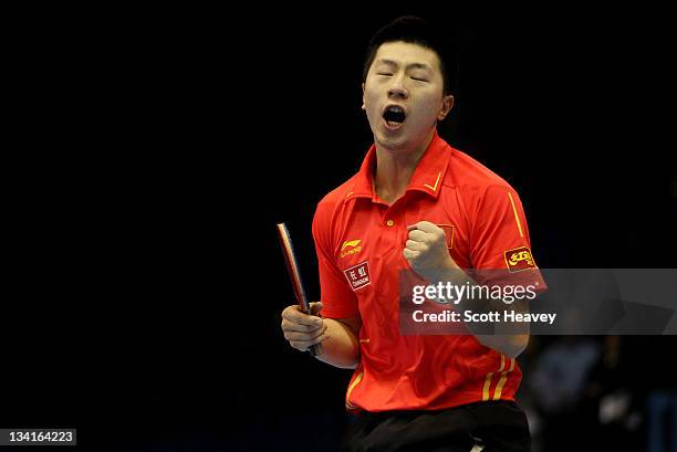 Ma Long of China celebrates winning the Men's Singles Final against Zhang Jike during day four of the ITTF Pro Tour Table Tennis Grand Finals at...