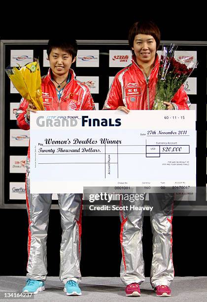 Guo Yue and Li Xiaoxia of China stand on the podium after winning their Women's Doubles Final match against Fukuhara Ai and Ishikawa Kasumi of Japan...