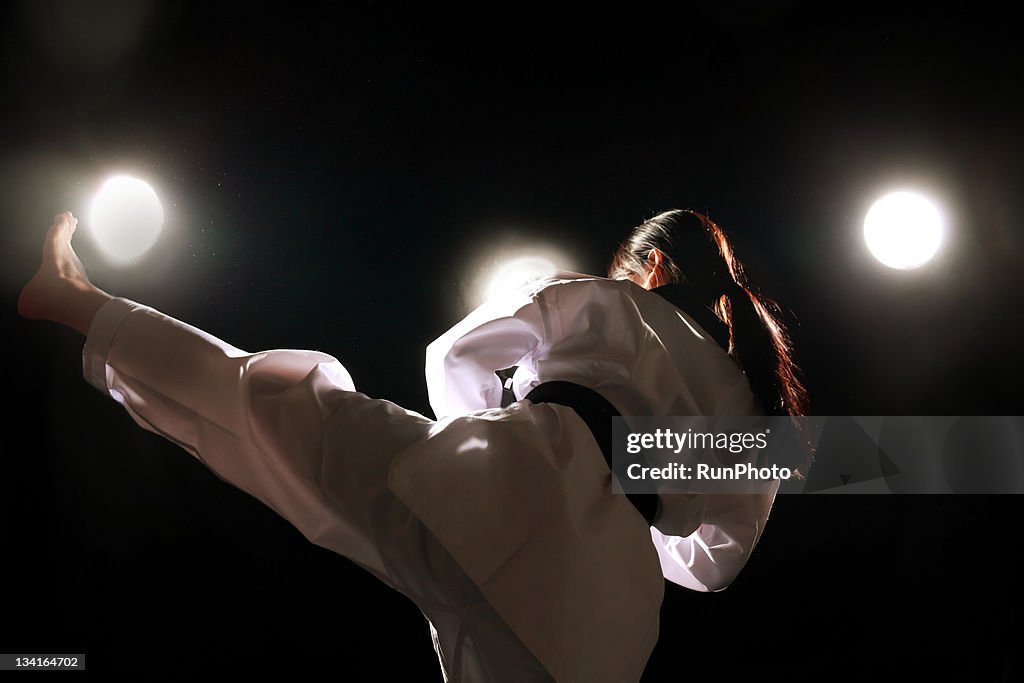 Young woman training,taekwondo