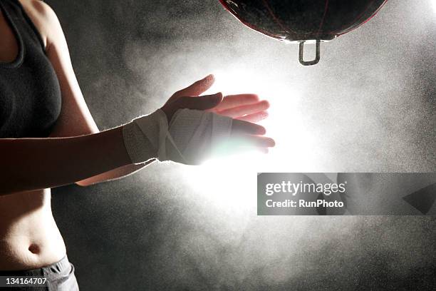 young woman training,boxing,hands close-up - boxeo deporte fotografías e imágenes de stock