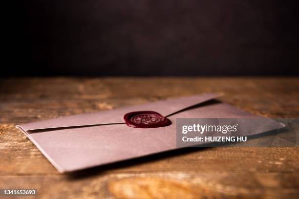 antique envelope with wax seal - letter envelope stock pictures, royalty-free photos & images