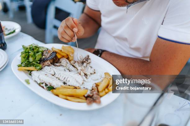 Man Frying Fish Man Frying Fish Photos and Premium High Res Pictures - Getty Images