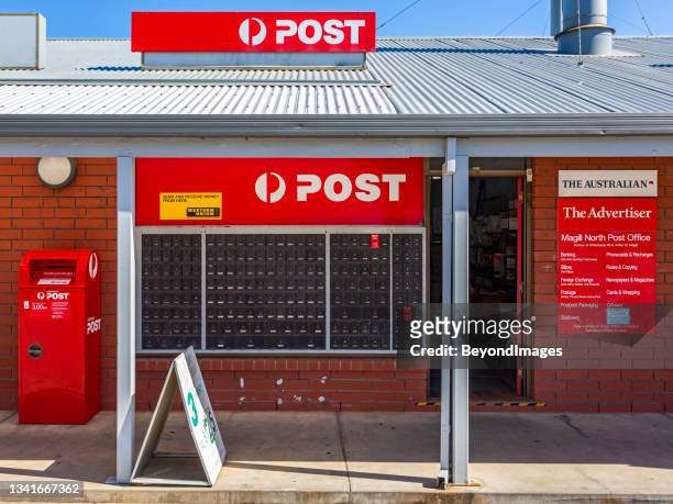 front view of entrance and facilities of small post office in suburban shopping precinct - letter box stock pictures, royalty-free photos & images