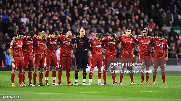 The Liverpool squad stand for a minutes silence before the Barclays Premier League match between Liverpool and Manchester City at Anfield on November...