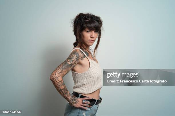 young tattooed woman - tattoo shoulder stock pictures, royalty-free photos & images