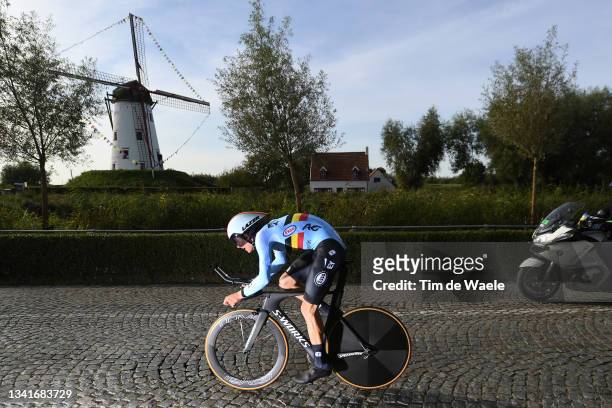 Alec Segaert of Belgium sprints in front of a windmill in Damar City during the 94th UCI Road World Championships 2021 - Men Junior ITT a 22,3km...