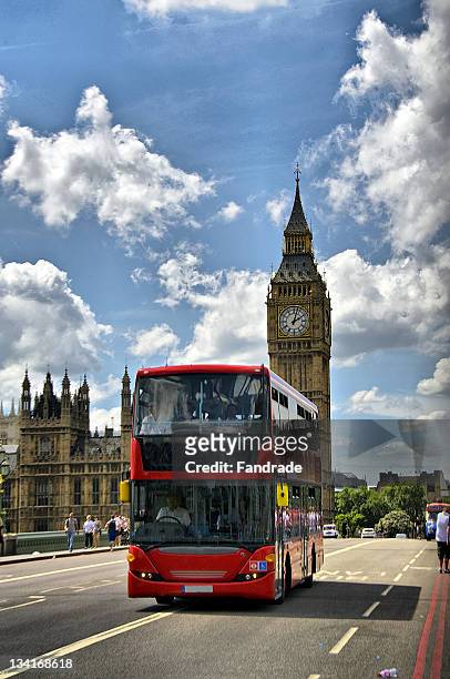 bus traveling on london road - london bus stock pictures, royalty-free photos & images