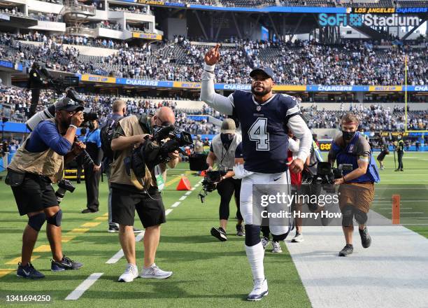 Dak Prescott of the Dallas Cowboys reacts as he leaves the filed after a 20-17 win over the Los Angeles Chargers at SoFi Stadium on September 19,...