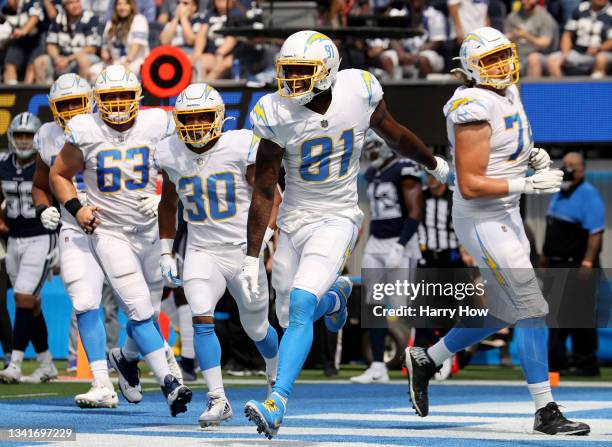 Mike Williams of the Los Angeles Chargers celebrates his touchdown catch during a 20-17 loss to the Dallas Cowboys at SoFi Stadium on September 19,...