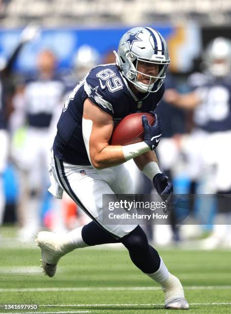 Blake Jarwin of the Dallas Cowboys cuts back during a 20-17 win over the Los Angeles Chargers at SoFi Stadium on September 19, 2021 in Inglewood,...