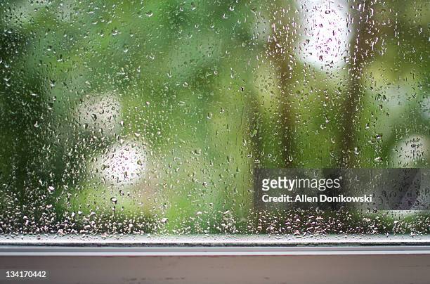 rain drops on window - windows stock pictures, royalty-free photos & images