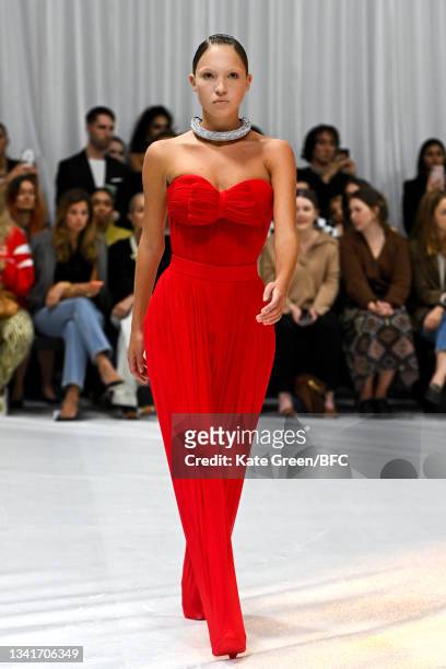 Lila Grace Moss Hack walks the runway at the Richard Quinn show during London Fashion Week September 2021 on September 21, 2021 in London, England.