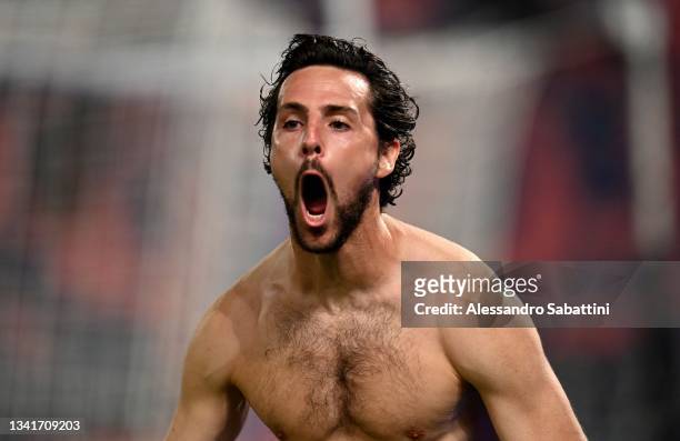Mattia Destro of Genoa CFC celebrates after scoring the 1-1 goal during the Serie A match between Bologna FC v Genoa CFC at Stadio Renato Dall'Ara on...