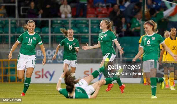 Amber Barrett and Katie McCabe celebrates the goal of Lucy Quinn at Tallaght Stadium on September 21, 2021 in Tallaght, Ireland.