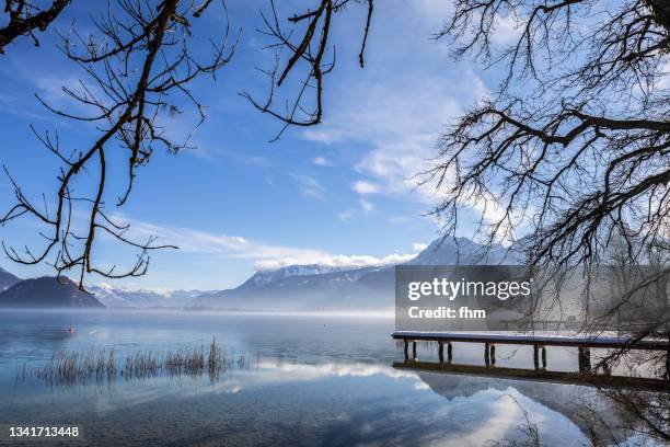 winter landscape in the alps (wolfgangsee/ austria) - österreich winter stock-fotos und bilder