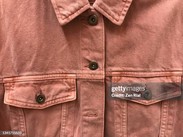 pinkish brown denim jacket with two flap breast pockets - double denim stock-fotos und bilder
