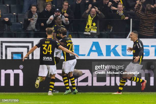 Erick Otieno of AIK celebrates scoring the 3-1 goal with teammates during the Allsvenskan match between AIK and IFK Goteborg at Friends Arena on...