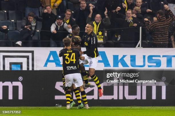 Erick Otieno of AIK celebrates scoring the 3-1 goal with teammates during the Allsvenskan match between AIK and IFK Goteborg at Friends Arena on...