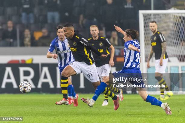 Nabil Bahoui of AIK against Simon Thern of IFK Goteborg during the Allsvenskan match between AIK and IFK Goteborg at Friends Arena on August 20, 2021...