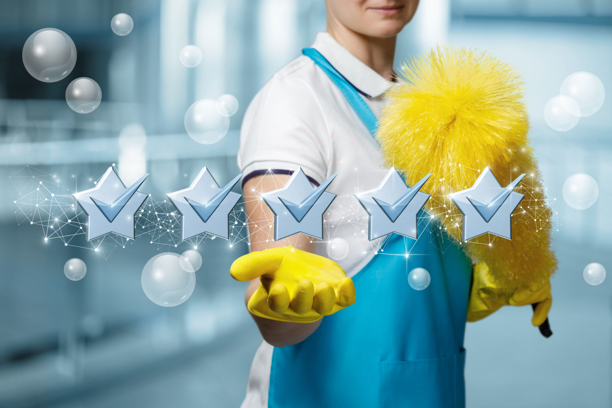 Cleaning lady with a smile on her face shows five star service . Cleaning lady with a smile on her face shows five star service .