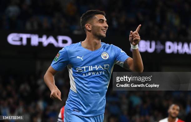 Ferran Torres of Manchester City celebrates after scoring their sides fourth goal during the Carabao Cup Third Round match between Manchester City...