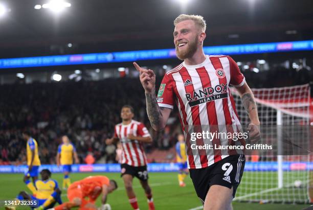 Oliver McBurnie of Sheffield United celebrates after scoring their team's second goal during the Carabao Cup Third Round match between Sheffield...