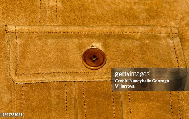 part and details of a brown suede leather jacket - daim photos et images de collection
